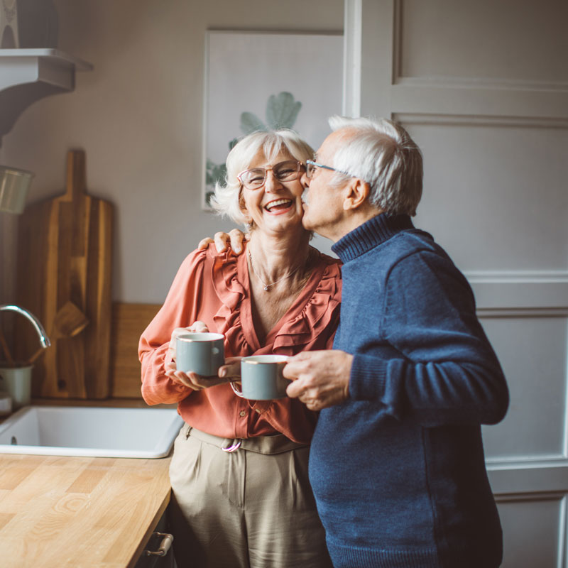 elderly couple smiling